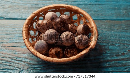 Image of blue table with quail eggs