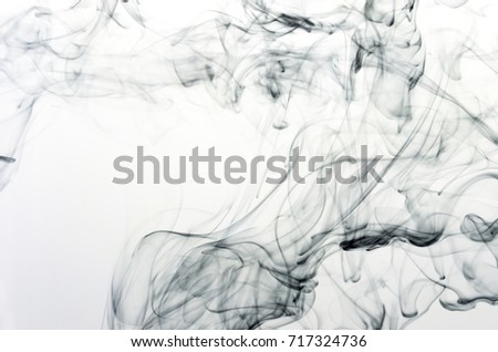 trace of ink dissolving in water