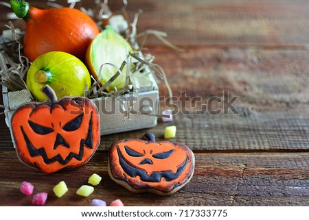 Gingerbread cookies on halloween, wooden old background copy of space