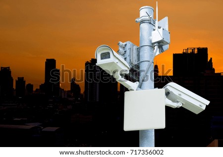 Cctv camera technology, video photography On the shadow city background