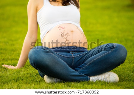 Enjoying pregnancy, expecting maternity, maternity photography, beautiful pregnant young woman outside, warm sunny picture