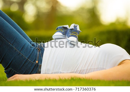 Enjoying pregnancy, expecting maternity, maternity photography, beautiful pregnant young woman outside, warm sunny picture