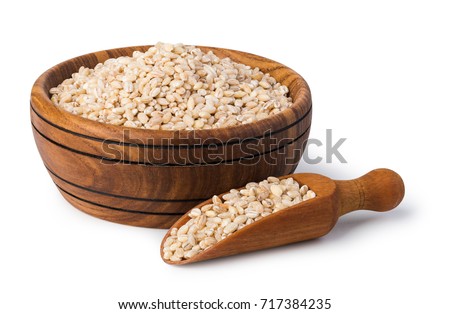 pearl barley isolated on white Royalty-Free Stock Photo #717384235