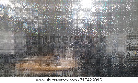 abstract colorful light of mosaic and bokeh on glass door or window at blur on secrets meeting room for art wallpaper and texture or party background Royalty-Free Stock Photo #717422095