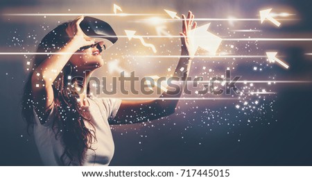 Arrows with young woman using a virtual reality headset