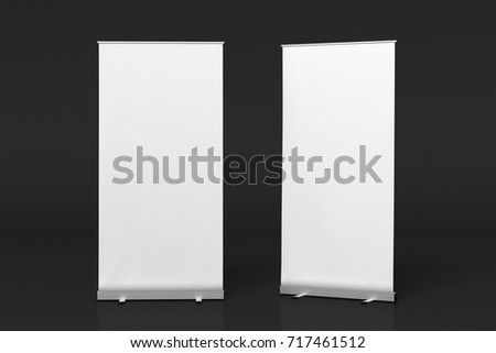 Two blank roll up banner stands isolated on black. Include clipping paths around ad banners. 3d illustration