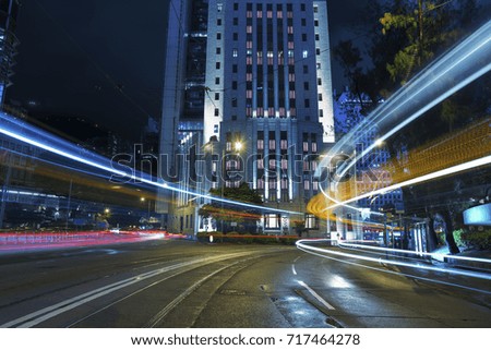Car Traffic in central district of Hong Kong city at night