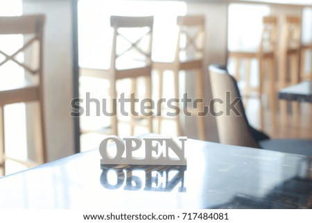 open sign on the table in restaurant