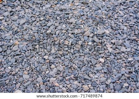 Background and texture of Small stones rock. Crushed gravel texture, outdoor