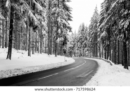 Beautiful winter landscape photo of snow covered road on mountain top. 
