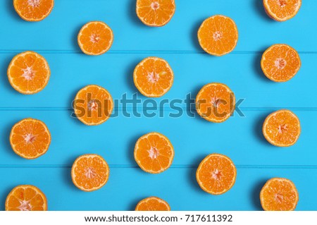 Oranges on wood table background with copy space. Top view.