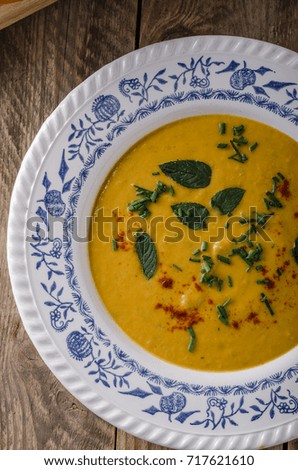 Sweet potato soup with herbs, chilli and garlic
