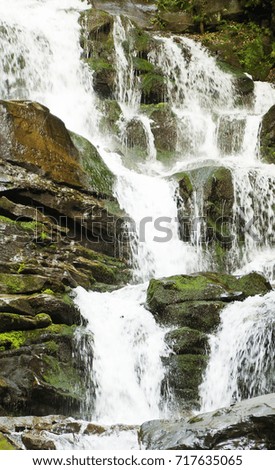 Mountain waterfall landscape, waterfall like a background, a backdrop or wallpaper.