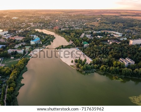 Aerial view on Mirgorod city from park side, Ukraine. Old photo style, sunset image 