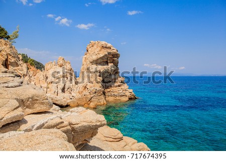 Beautiful Summer Seascape, summertime travel vacation, turquoise sea water and rocky coast of Greece. 