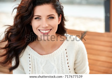 beautiful smiling woman in the park
