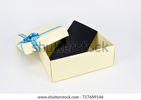  Opened Gift Box with Touchscreen Smartphone on white background.Selective focus.