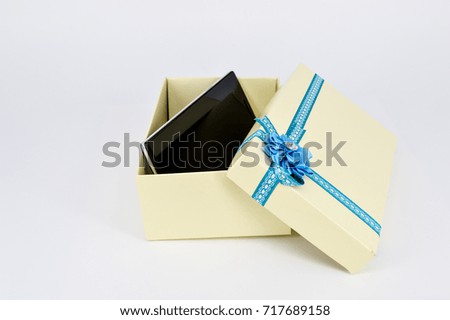  Opened Gift Box with Touchscreen Smartphone on white background.Selective focus.