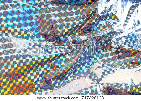 Holographic holologram paper background texture.