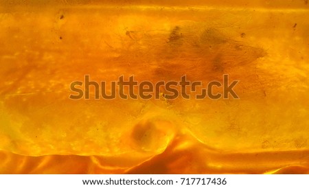 Behind the yellow resin , texture