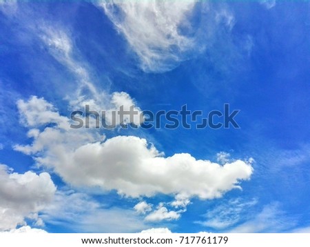 Nice blue sky with white clouds background . Cumulus clouds in blue sky. A beautiful clouds in the nice day. Abstract gorgeous sky for your design.