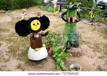 Cartoon characters made of secondary raw materials on playground