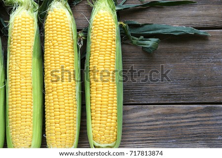 Corn on the wooden board, food close-up