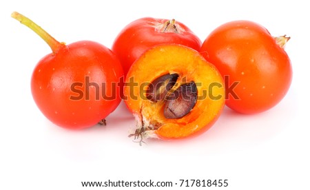 red rowan with slice isolated on white background. macro