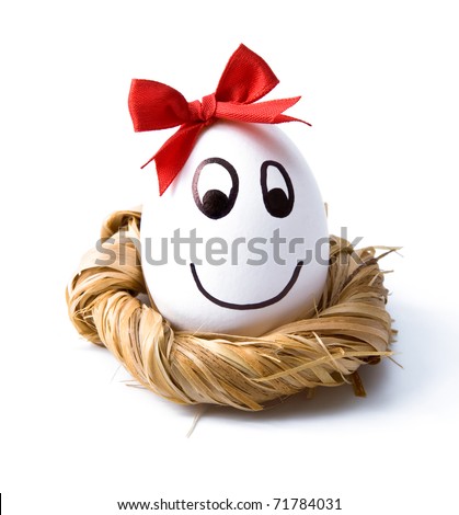 Easter egg painted with a person lying in the nest
