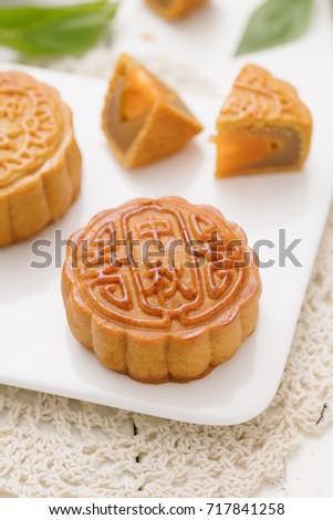 Delicious Mooncake, a kind of traditional Chinese Snack for Mid-Autumn Festival on the Table.