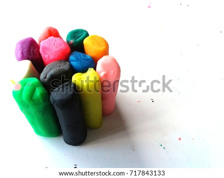 colorful piece set of modelling clay or plasticine with rainbow color for children play with they creativity, imagination and dream on white background. text