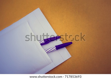 Pens in envelope ,Business Delivery concept.