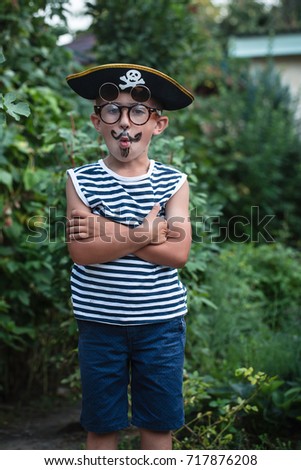 A cute little boy in a pirate costume