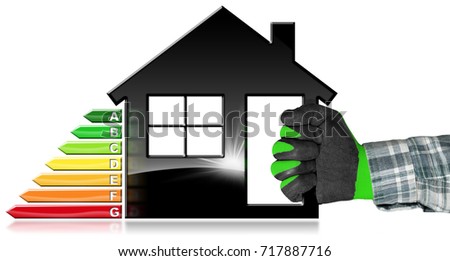 Hand with work glove (photo) holding a black symbol in the shape of a house (3d illustration) with energy efficiency rating. Isolated on white background