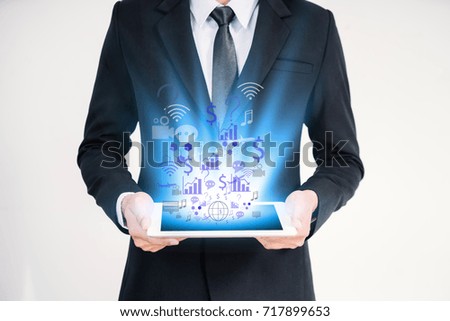 business man use laptop with business icon