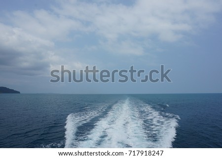 Water trail behind a boat