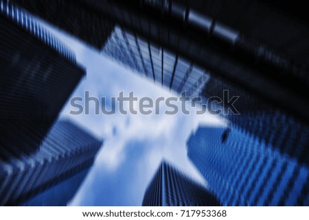 Business and finance building in motion in blue tones in Paris