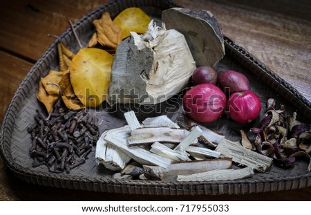 Traditional herbal medicine herbs are popular in malaysia in the tray Royalty-Free Stock Photo #717955033