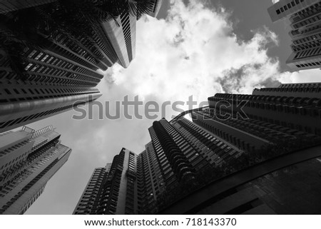 Skyline with skyscrapers, high-rise living buildings in Hong Kong city, black and white photo