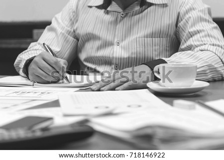 Business - meeting in an office, lawyers or attorneys discussing a document or contract agreement Royalty-Free Stock Photo #718146922