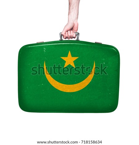 Mauritania flag on a vintage leather suitcase.