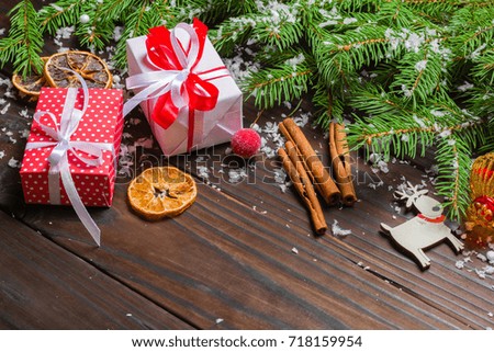 Dark Christmas background. Gifts and congratulations on the New Year. Family meeting. Copy space.