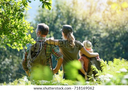 Family on a rambling day in countryside Royalty-Free Stock Photo #718169062