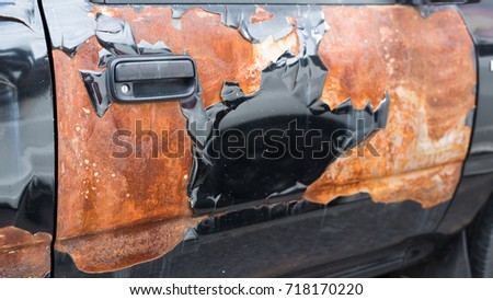 Door handle of old and rusty car
