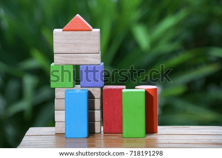 Colorful wooden building blocks. Selective focus