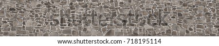 Texture of a stone wall. Old castle stone wall texture background. Stone wall as a background or texture. Part of a stone wall, for background or texture Royalty-Free Stock Photo #718195114