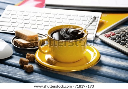 Coffee in a composition with objects for doing business