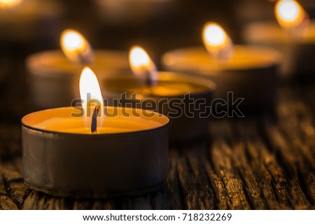 Christmas candles burning at night.  Royalty-Free Stock Photo #718232269