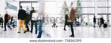 blurred business people