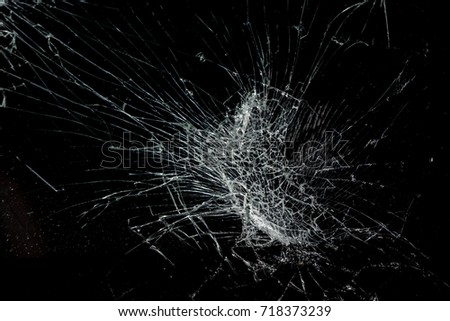 Top view cracked broken mobile screen glass texture background.